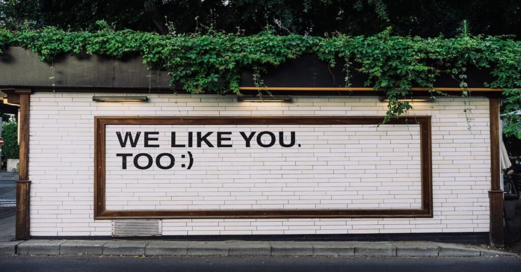"We like you too" written on a wall