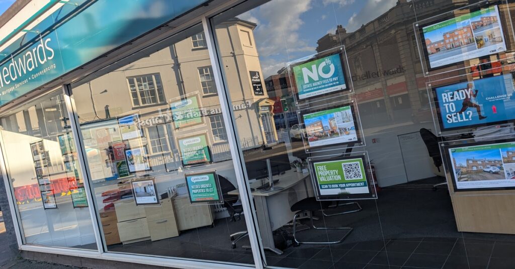 UK estate agency window for renting a home in the UK